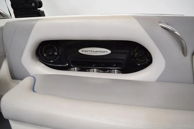 Slide: The Image of Interior of 2007 Centurion SV 240 boat with speaker and cup holders. - 12