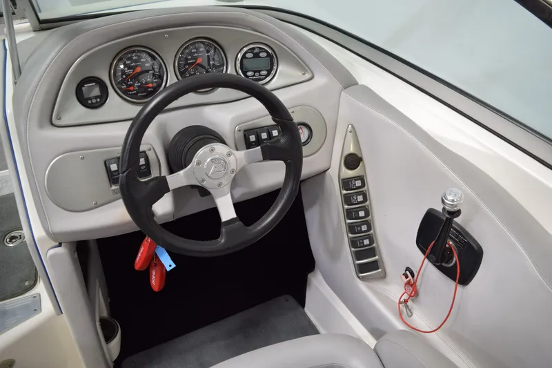 Slide: The Image of Steering wheel and dashboard of a 2007 Centurion SV 240 boat. - 17