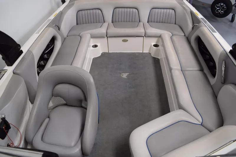 Slide: The Image of 2007 Centurion SV 240 boat interior with gray seating and spacious layout. - 20