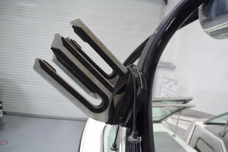 Slide: The Image of Wakeboard rack on a 2007 Centurion SV 240 boat, featuring a sleek black design. - 22