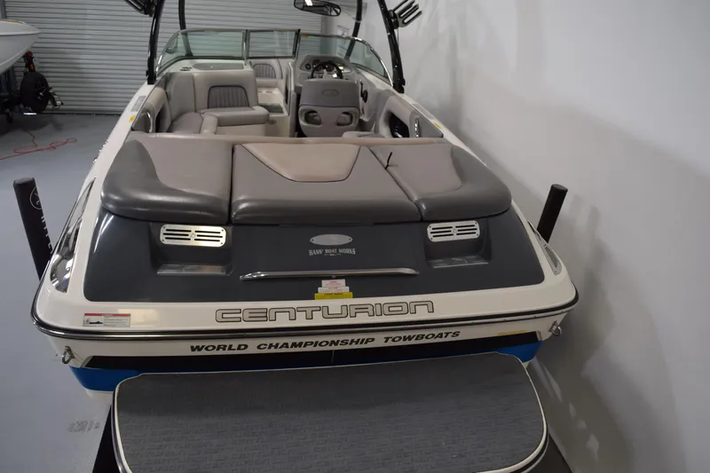 Slide: The Image of 2007 Centurion SV 240 boat, interior view, showcasing seating and dashboard. - 8