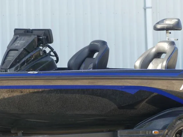Slide: The Image of 2022 Nitro Z21 Pro boat with blue accents and two seats. - 15