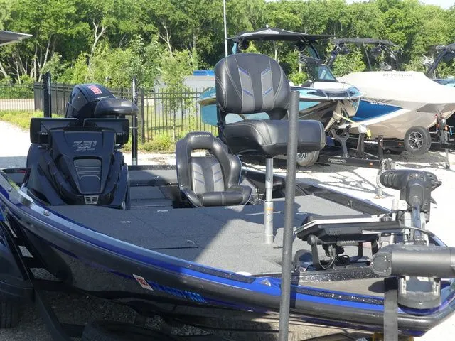 Slide: The Image of 2022 Nitro Z21 Pro boat in a parking lot. - 20