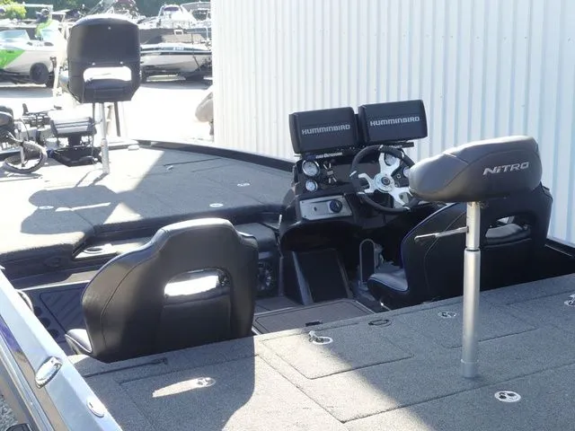 Slide: The Image of 2022 Nitro Z21 Pro boat with modern console and seating. - 25