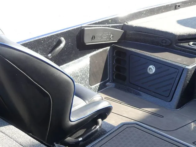 Slide: The Image of Interior of 2022 Nitro Z21 Pro with seat and storage. - 28