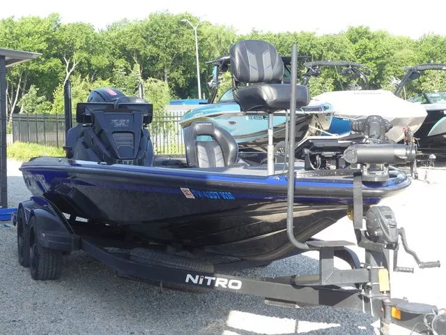 Slide: The Image of 2022 Nitro Z21 Pro boat parked on trailer outdoors. - 3