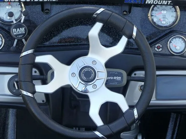 Slide: The Image of Steering wheel of 2022 Nitro Z21 Pro boat with dashboard. - 32
