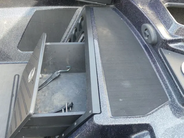Slide: The Image of 2022 Nitro Z21 Pro boat with open storage compartment. - 36