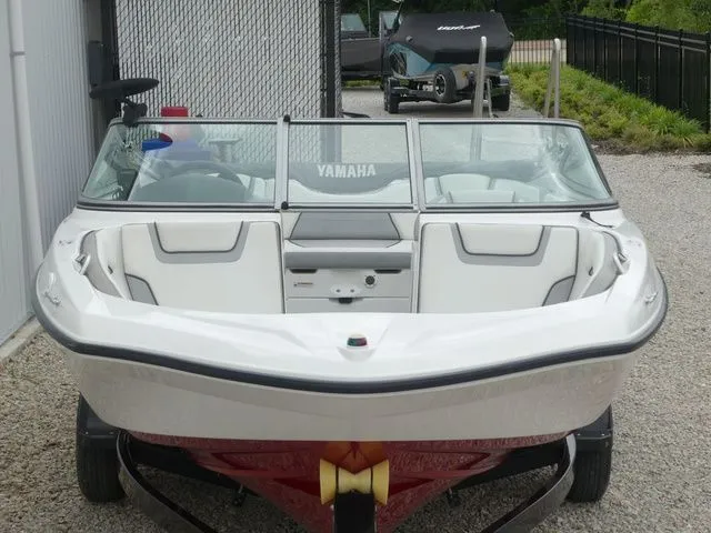 Slide: The Image of 2018 Yamaha SX190 boat, front view parked on trailer. - 12