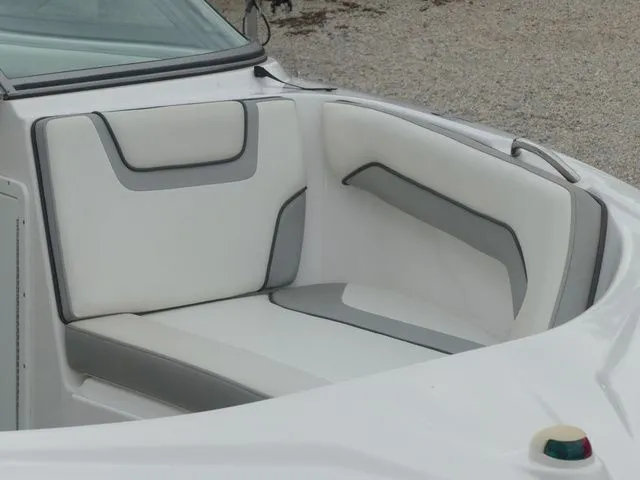 Slide: The Image of Interior of 2018 Yamaha SX190 boat with white and gray seating. - 14