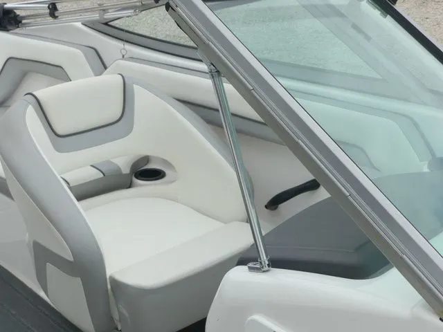 Slide: The Image of Interior of a 2018 Yamaha SX190 boat with beige seating. - 18