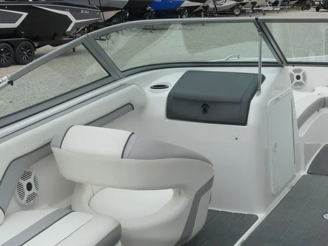 Slide: The Image of Interior of a 2018 Yamaha SX190 boat with white seating. - 27