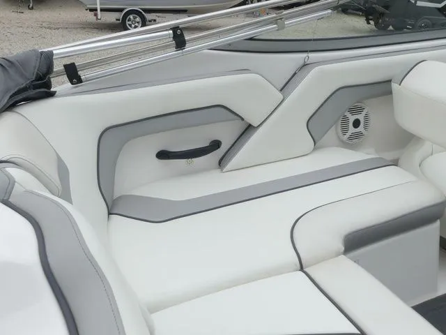 Slide: The Image of Interior of a 2018 Yamaha SX190 boat with white upholstery. - 29