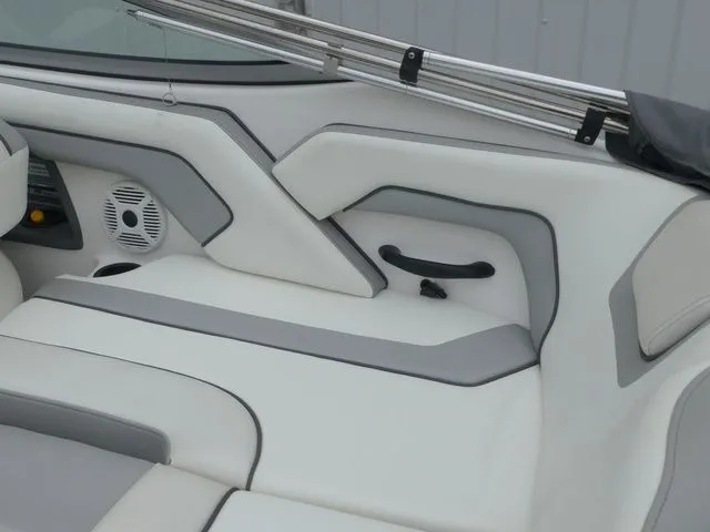 Slide: The Image of Interior of a 2018 Yamaha SX190 boat with gray and white upholstery. - 30
