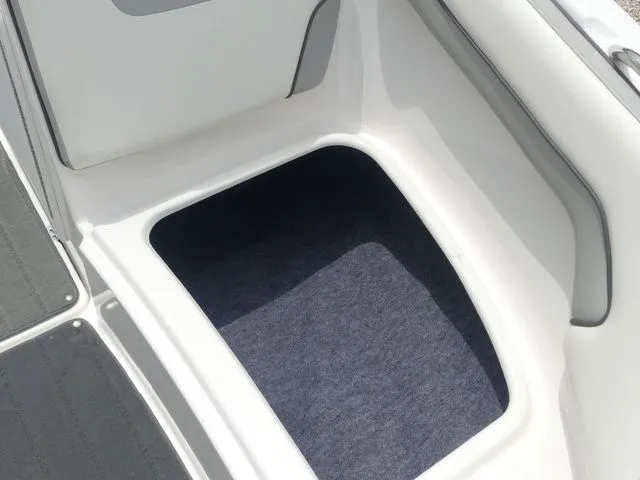 Slide: The Image of Storage compartment in 2018 Yamaha Boats SX190. - 34