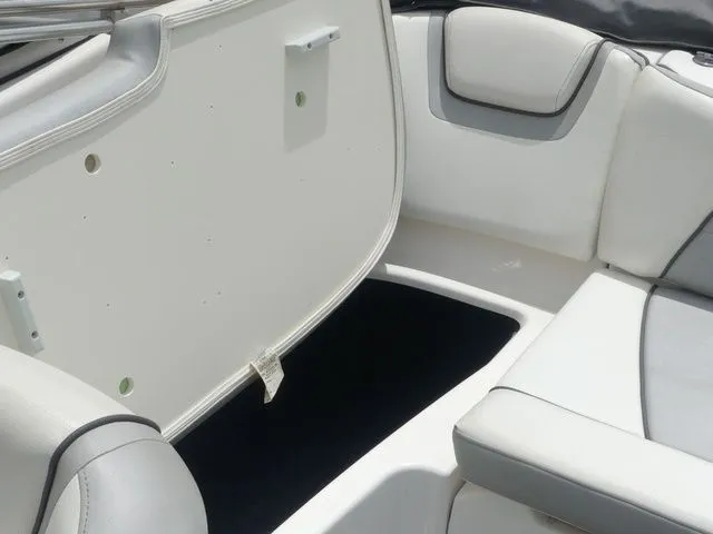 Slide: The Image of Interior of a 2018 Yamaha SX190 boat with storage compartment. - 37