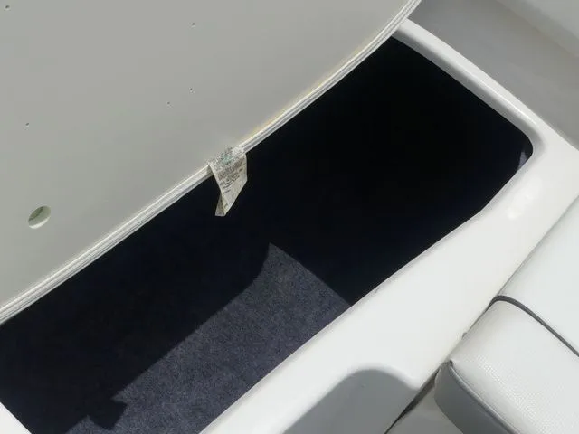 Slide: The Image of Storage compartment in 2018 Yamaha SX190 boat. - 38