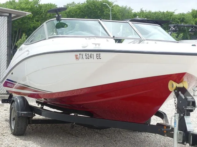 Slide: The Image of 2018 Yamaha SX190 boat on trailer, white and red. - 4