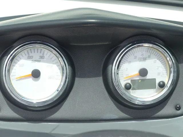 Slide: The Image of Dashboard of a 2018 Yamaha SX190 boat with gauges. - 47