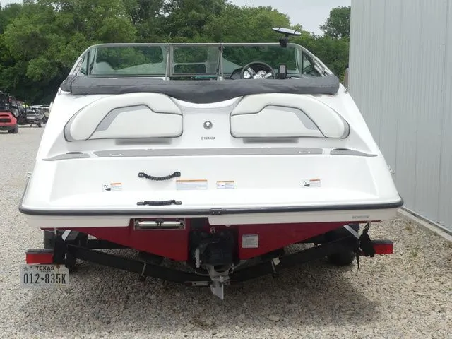 Slide: The Image of Rear view of a 2018 Yamaha SX190 boat on a trailer. - 5
