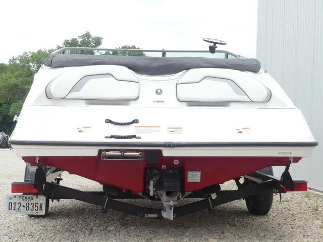 Slide: The Image of Rear view of a 2018 Yamaha SX190 boat on trailer. - 7