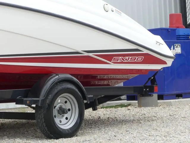 Slide: The Image of 2018 Yamaha SX190 boat on trailer, side view. - 8