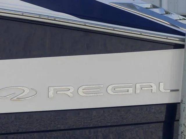 Slide: The Image of Close-up of Regal 2500 boat logo, year 2015. - 11