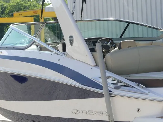 Slide: The Image of 2015 Regal 2500 boat, side view at the dock. - 16