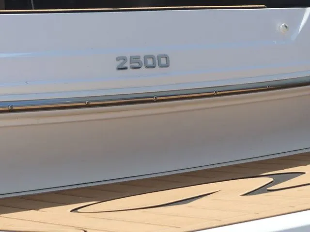 Slide: The Image of Regal 2500 boat from 2015 docked. - 18