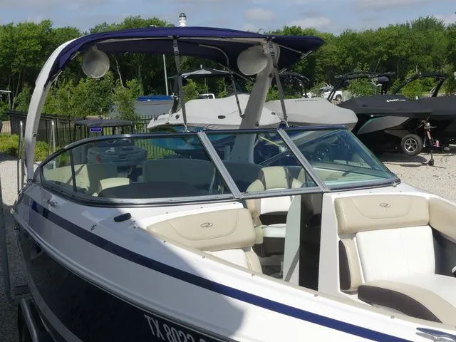 Slide: The Image of 2015 Regal 2500 boat docked at marina. - 20