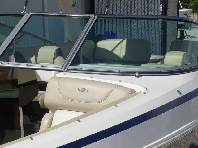 Slide: The Image of Interior of a 2015 Regal 2500 boat with beige seats. - 24