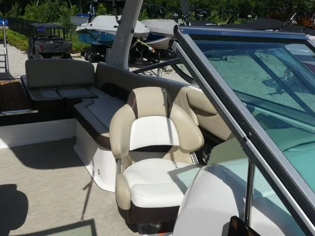 Slide: The Image of Interior of a 2015 Regal 2500 boat with seating area. - 26