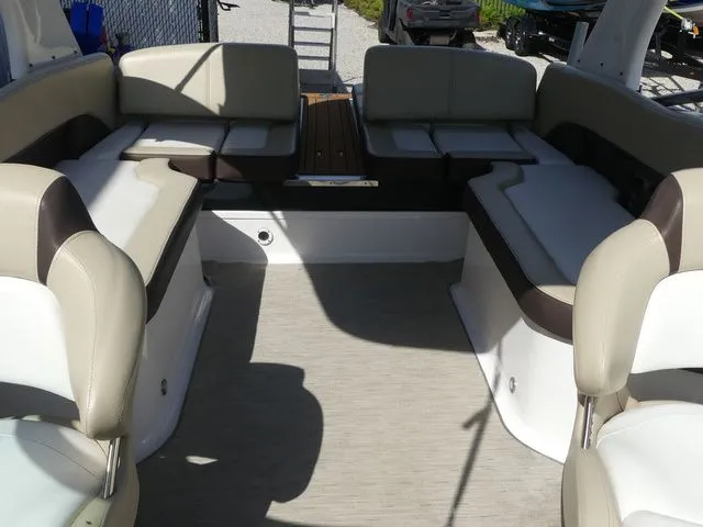 Slide: The Image of Interior of a 2015 Regal 2500 boat with beige seating. - 28