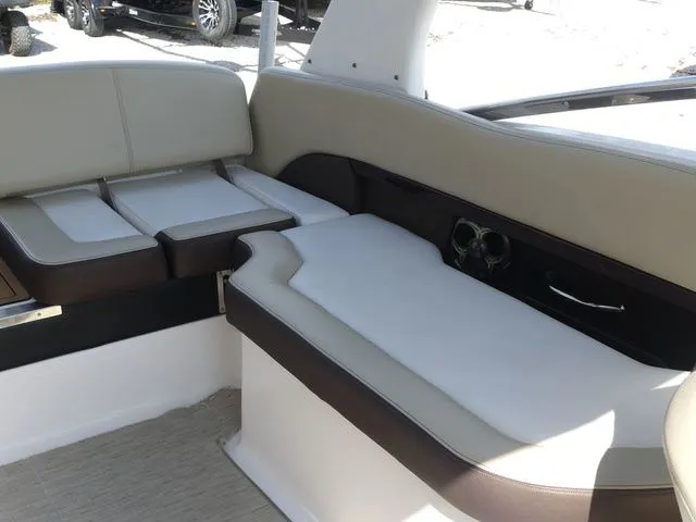 Slide: The Image of Interior of a 2015 Regal 2500 boat with beige seating. - 29