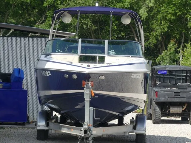Slide: The Image of 2015 Regal 2500 boat on trailer, front view. - 3