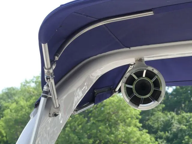 Slide: The Image of 2015 Regal 2500 boat with speaker and canopy. - 33