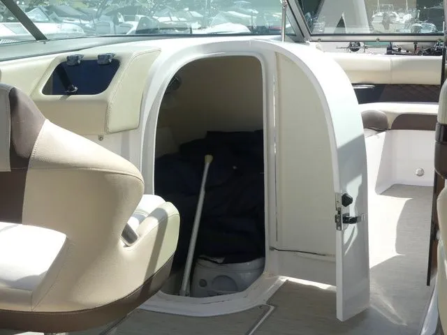 Slide: The Image of Interior of a 2015 Regal 2500 boat with storage space. - 41