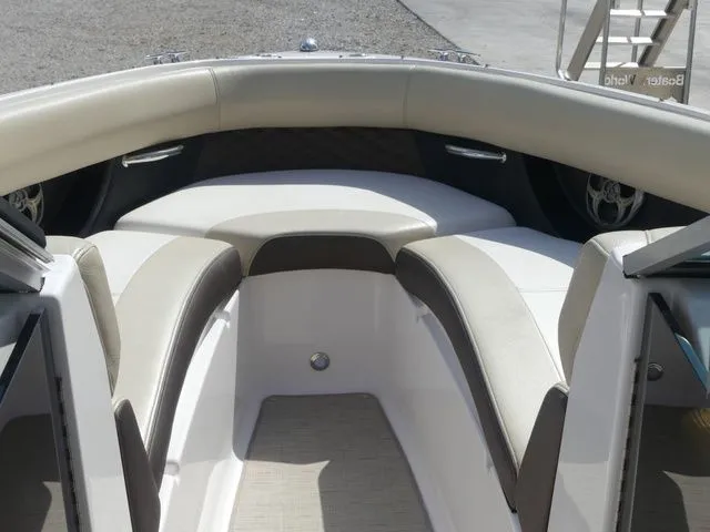 Slide: The Image of Interior of a 2015 Regal 2500 boat with beige seating. - 42