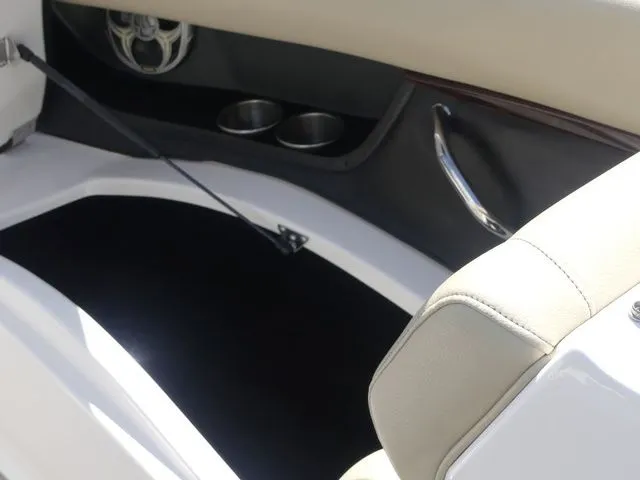 Slide: The Image of Interior of a 2015 Regal 2500 boat with beige seating. - 48