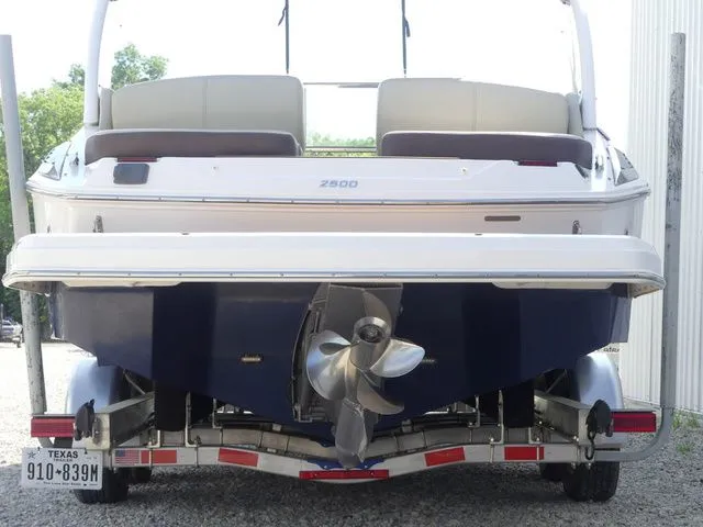 Slide: The Image of Rear view of a 2015 Regal 2500 boat on a trailer. - 6
