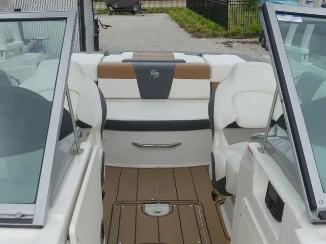 Slide: The Image of Interior of a 2023 Chaparral 21 Surf boat with luxurious seating. - 26