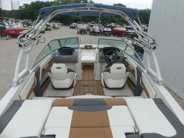 Slide: The Image of Interior view of 2023 Chaparral 21 Surf boat, modern seating and controls. - 33