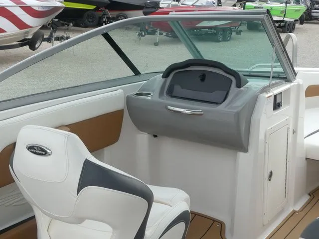 Slide: The Image of Interior of 2023 Chaparral 21 Surf with helm console. - 34
