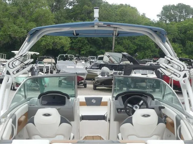 Slide: The Image of Interior view of 2023 Chaparral 21 Surf boat at marina. - 41