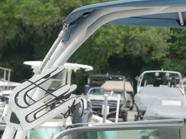 Slide: The Image of Chaparral 21 Surf 2023 boat with blue canopy and accessories. - 42