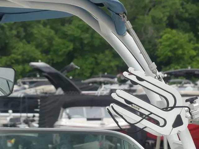 Slide: The Image of Chaparral 21 Surf 2023 boat with wakeboard rack at marina. - 43