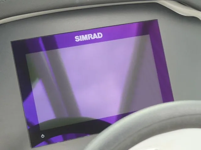 Slide: The Image of Simrad display in Chaparral 21 Surf boat, 2023 model. - 49