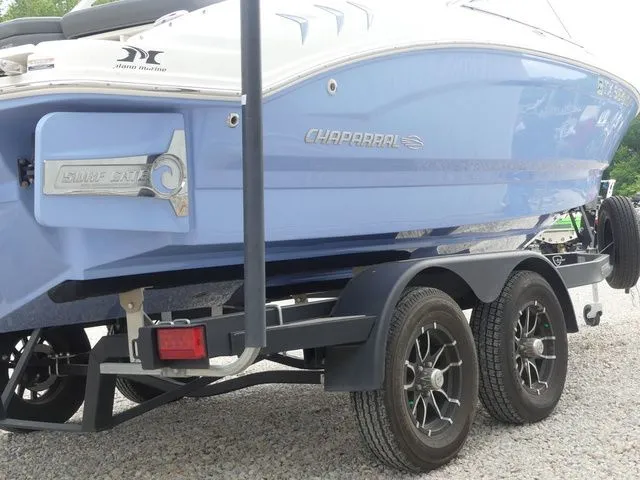 Slide: The Image of 2023 Chaparral 21 Surf boat on trailer, side view. - 9