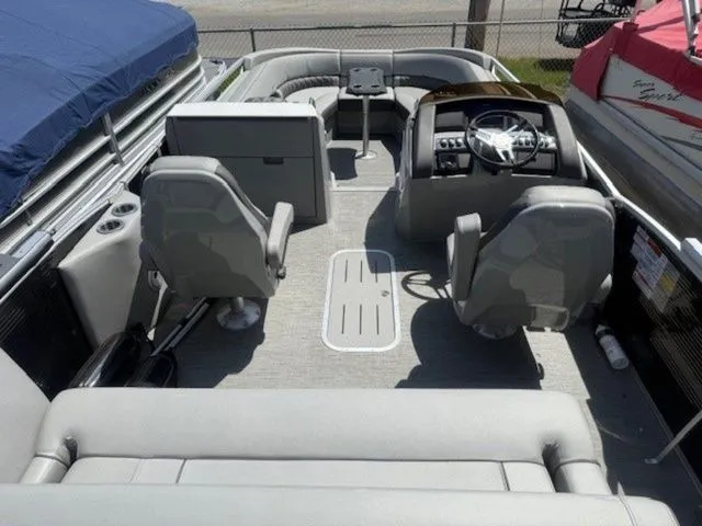 Slide: The Image of Interior of 2023 Bennington 25 RTSB pontoon boat with gray seating. - 4