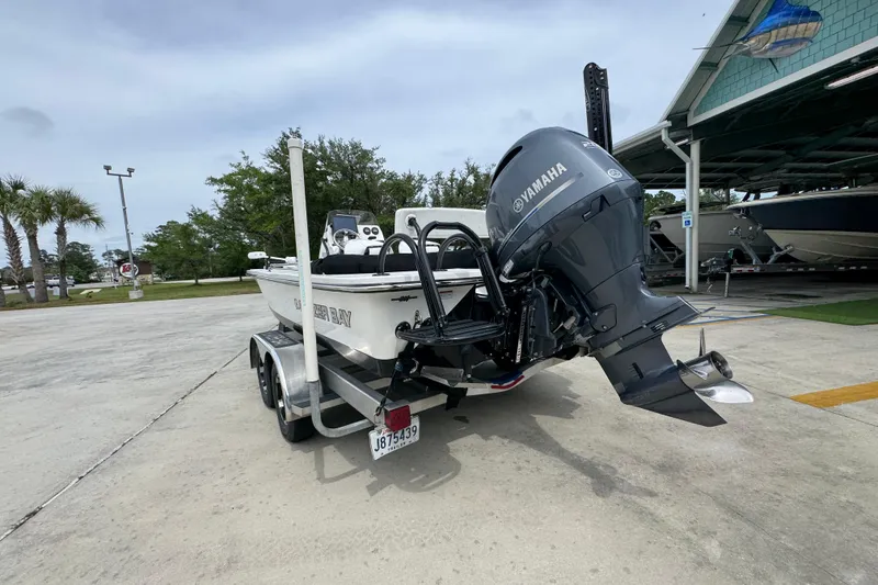 Slide: The Image of 2021 Blazer Bay 2220 GTS boat with Yamaha engine on trailer. - 13